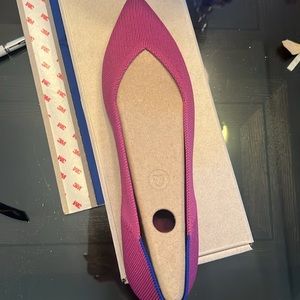Rothy‘s flats. Adorable, wild orchid. Never worn recently purchased. in the box.
